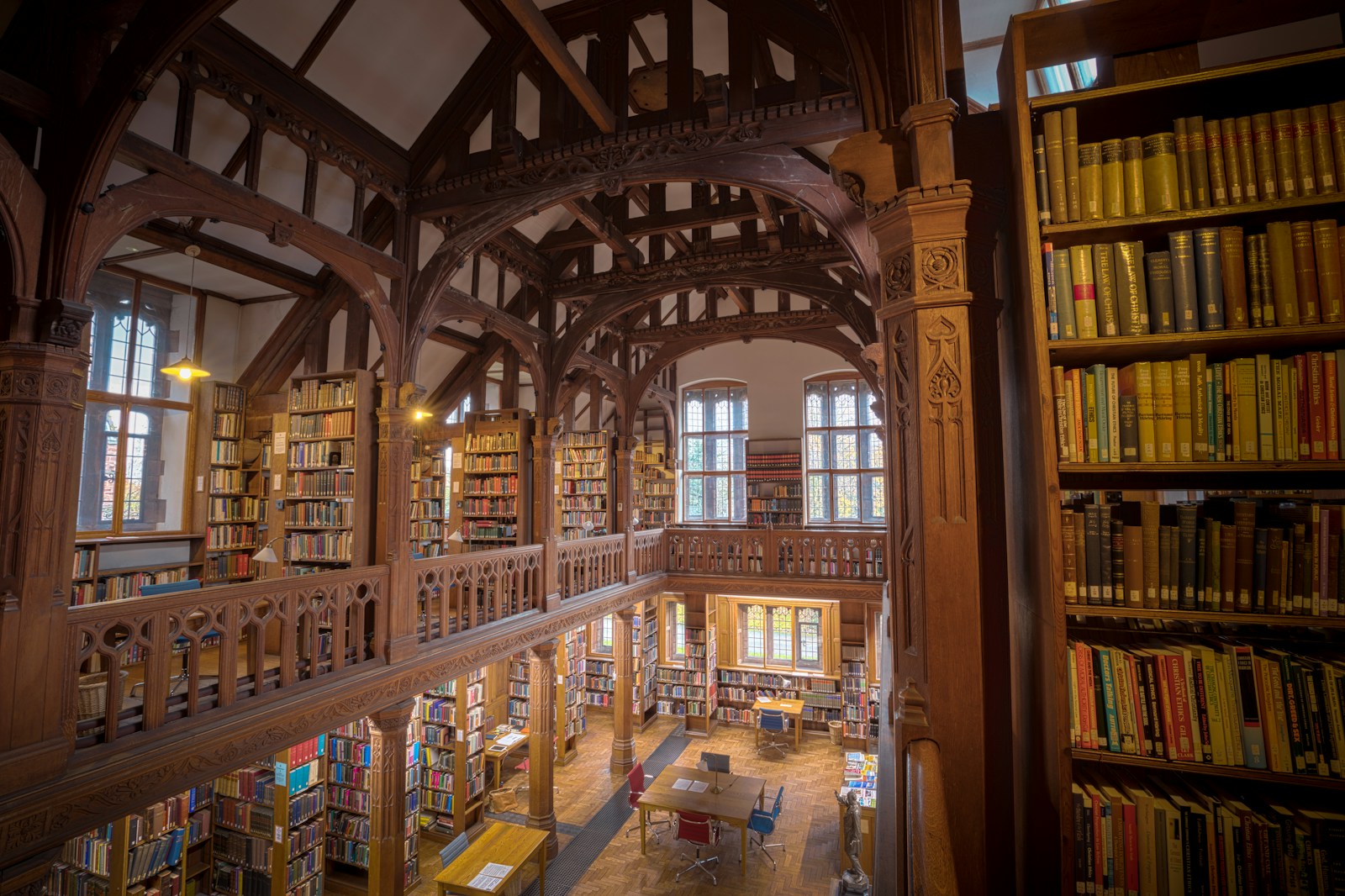 Interior of a panelled library with bookshelves